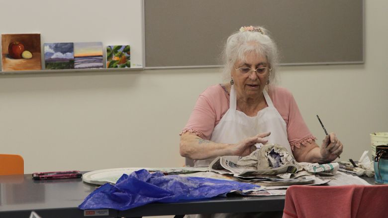 Josie Adler, 80, molds a mask in a pottery class in Berkeley, California.