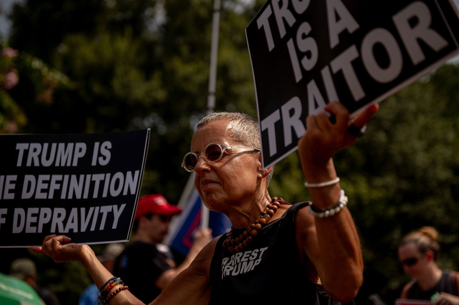 Anti-Trump protester Laurie Arbeiter demonstrates outside of the jail on Thursday.