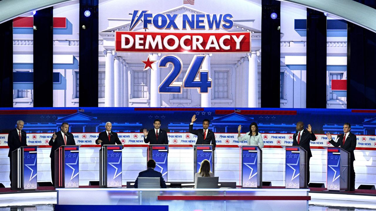 TOPSHOT - (From L) Former Governor of Arkansas Asa Hutchinson, former Governor of New Jersey Chris Christie, former US Vice President Mike Pence, Florida Governor Ron DeSantis, entrepreneur and author Vivek Ramaswamy, former Governor from South Carolina and UN ambassador Nikki Haley, US Senator from South Carolina Tim Scott and North Dakota Governor Doug Burgum, take part in the first Republican Presidential primary debate at the Fiserv Forum in Milwaukee, Wisconsin, on August 23, 2023. Candidates were asked to raise their hands if they would support former US president Donald Trump as the Republican presidential candidate if he were to be convicted of crimes for which he has been indicted. (Photo by Brendan SMIALOWSKI / AFP) (Photo by BRENDAN SMIALOWSKI/AFP via Getty Images)