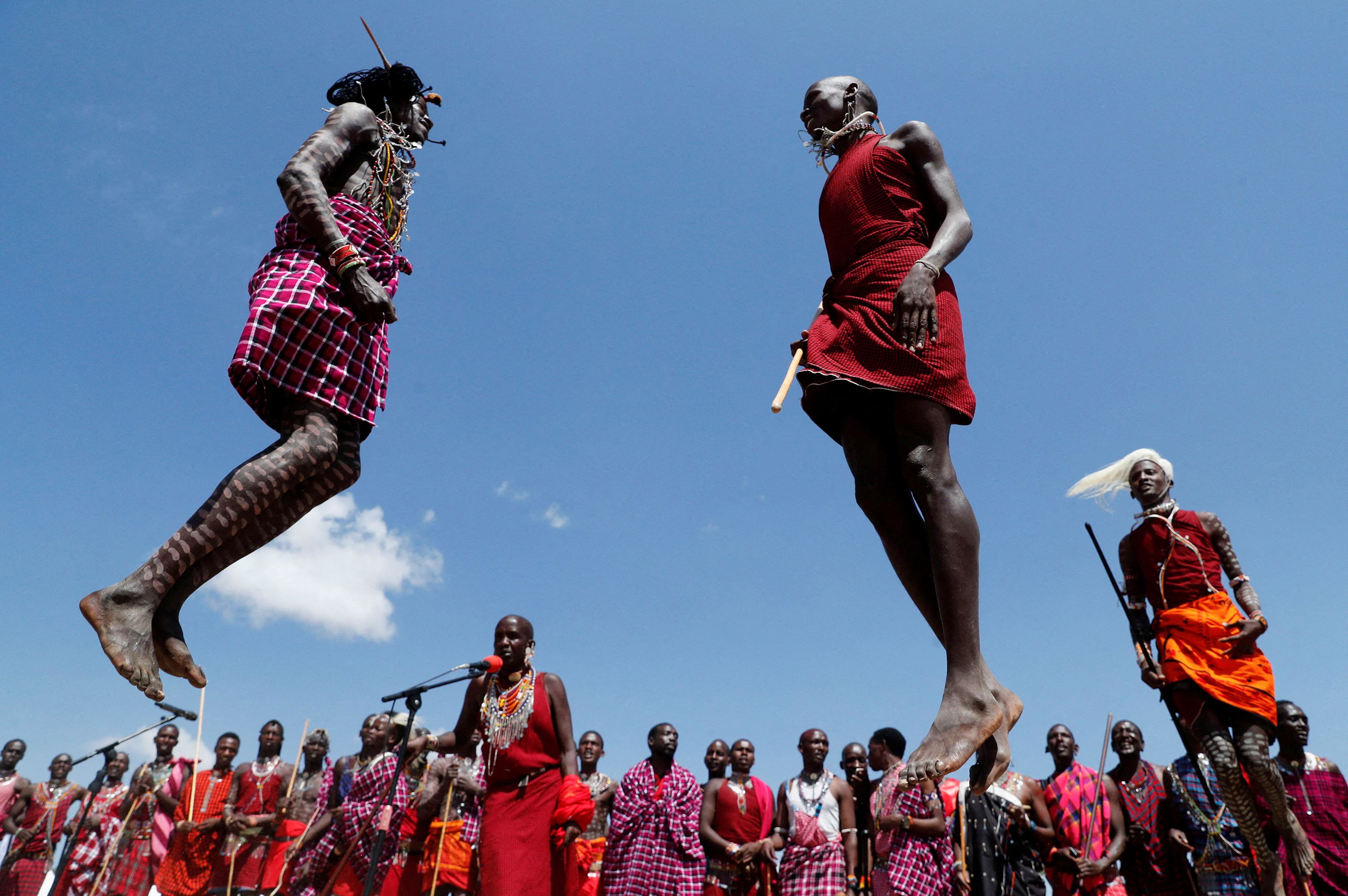 Members of the indigenous Maasai community sing and jump Tuesday, August 22, during the inaugural Maa Cultural Week in Kenya's Narok County. The festival aims to promote peace, tourism and cultural exchange.