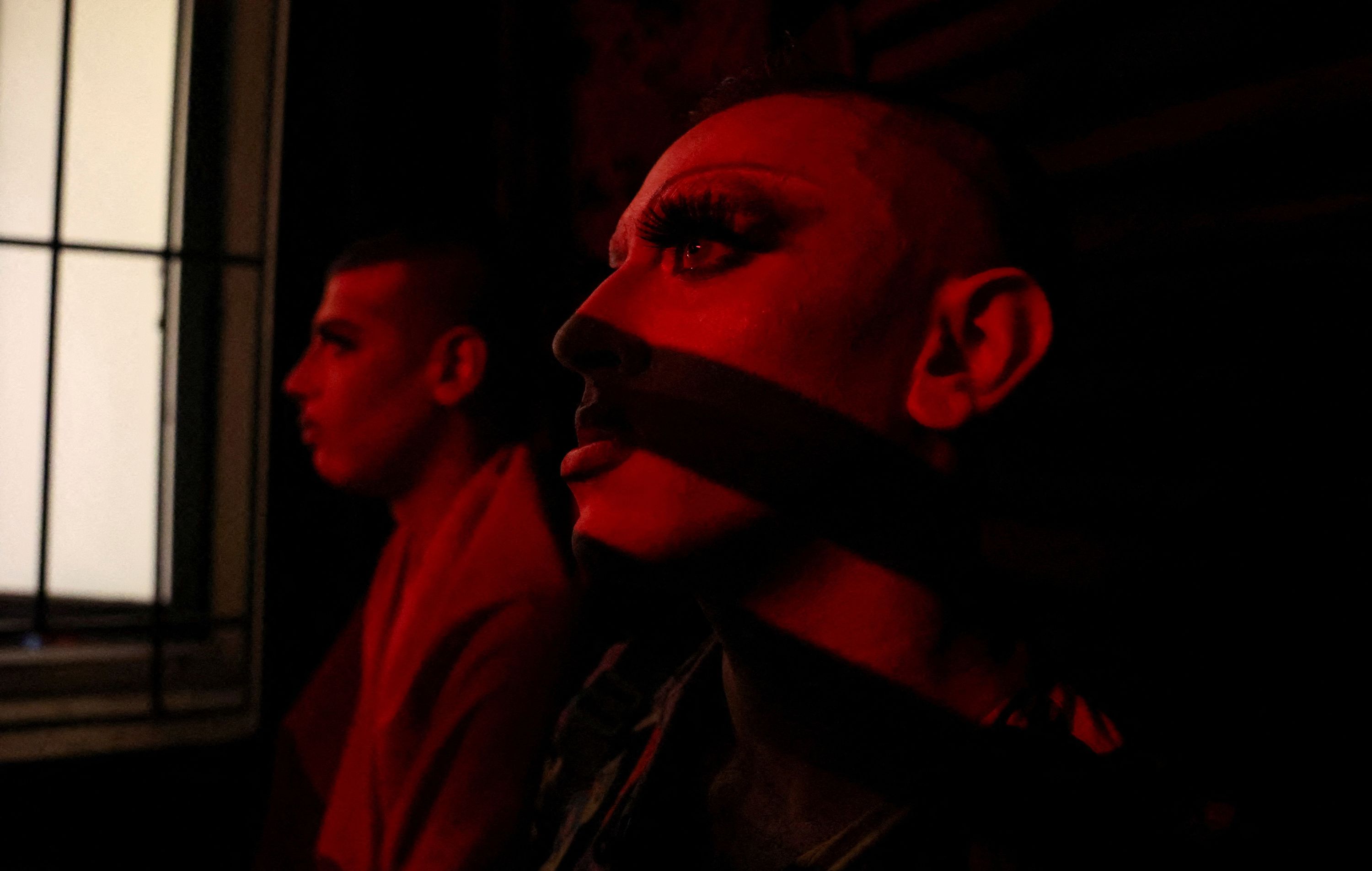 Drag artist Emma Gration hides on the terrace of a bar in Beirut, Lebanon, after a drag show was cut short by an anti-LGBT group screaming homophobic chants on Wednesday, August 23.