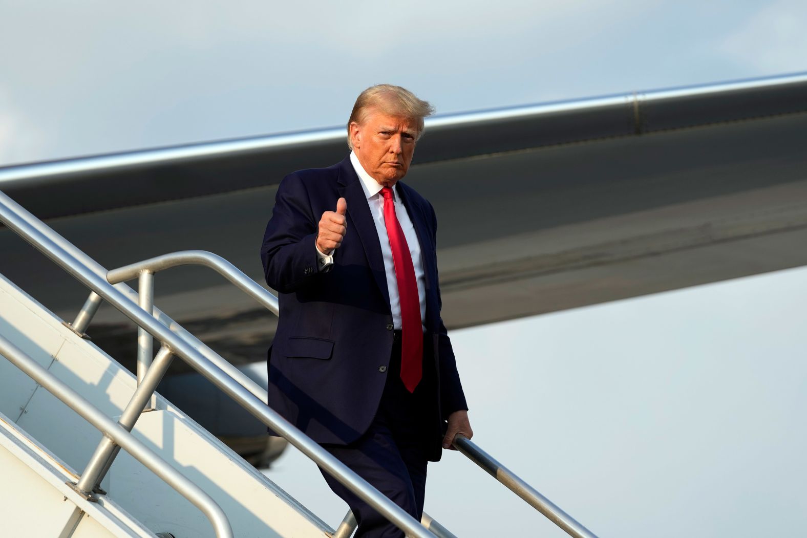 Trump lands at the Atlanta airport on Thursday.