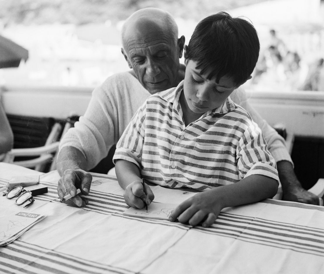 A young Claude Ruiz-Picasso with his father 