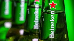 FILE - Bottles of Heineken beer are photographed in Washington, USA, March 30, 2018. Dutch brewer Heineken has completed its withdrawal from Russia, 18 months after Moscow launched its full-scale invasion of Ukraine, selling its business in Russia for just 1 euro, the company announced Friday, Aug. 25, 2023. (AP Photo/J. David Ake, FILE)