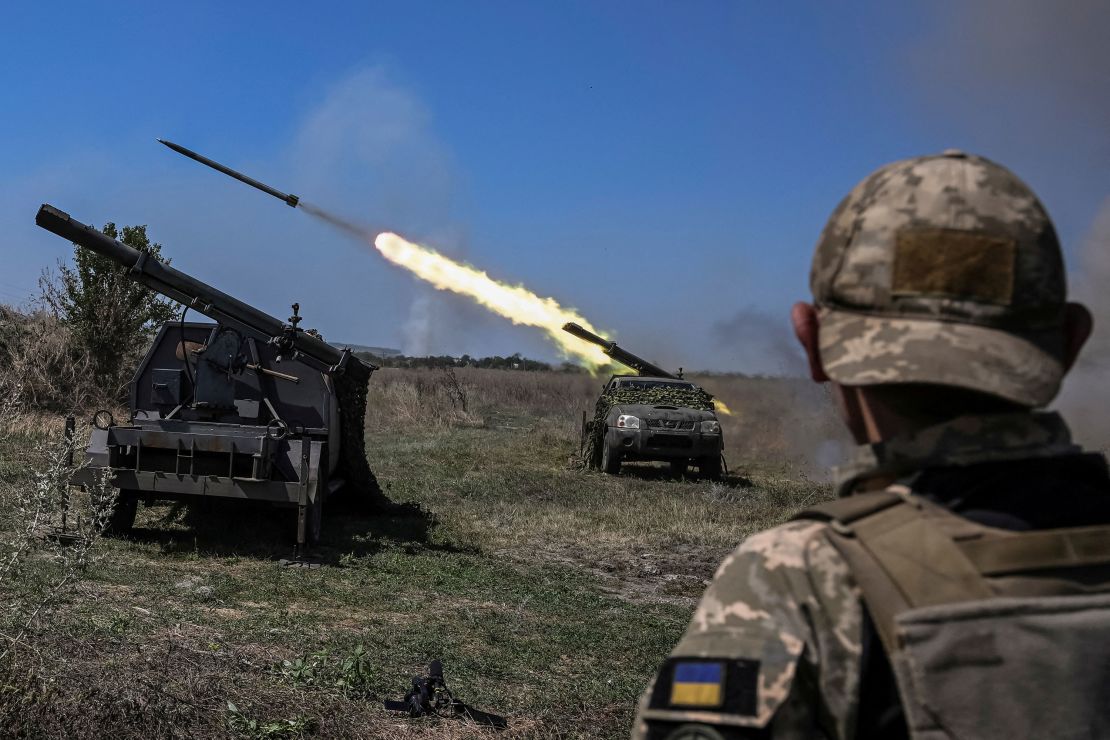 Ukrainian troops launch rockets near the front line in Zaporizhzhia region.