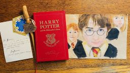 Pictured is the special Harry Potter book with Carina Haouchine's competition entry from when she was 15.