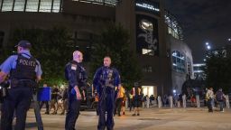 Chicago police officers stand outside Guaranteed Rate Field on Friday night, Aug. 25, 2023, in Chicago. Police are investigating a shooting at a White Sox baseball game a the stadium Friday night. Police said the investigation is ongoing. (Tyler Pasciak LaRiviere/Chicago Sun-Times via AP)