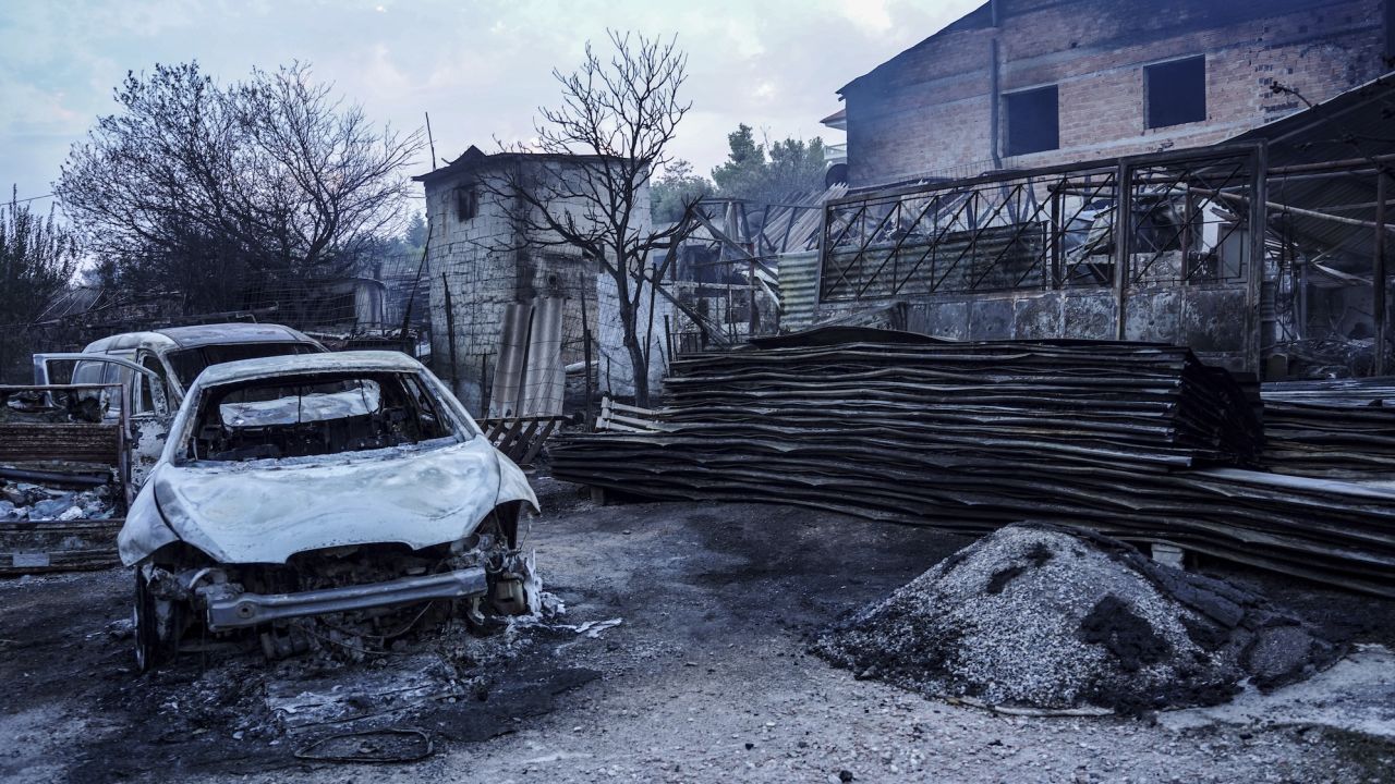 Burning cars destroyed by the fire on Mount Parnitha in Athens, Greece, on August 23, 2023.