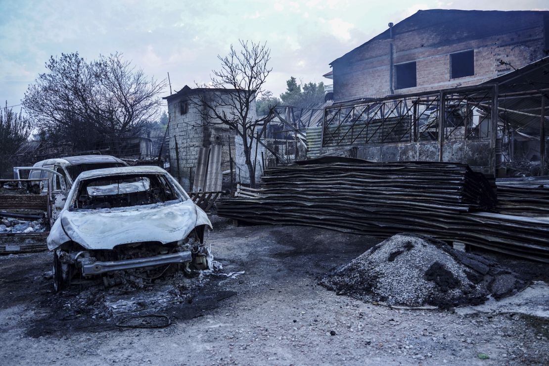Burning cars destroyed by the fire on Mount Parnitha in Athens, Greece, on August 23, 2023.