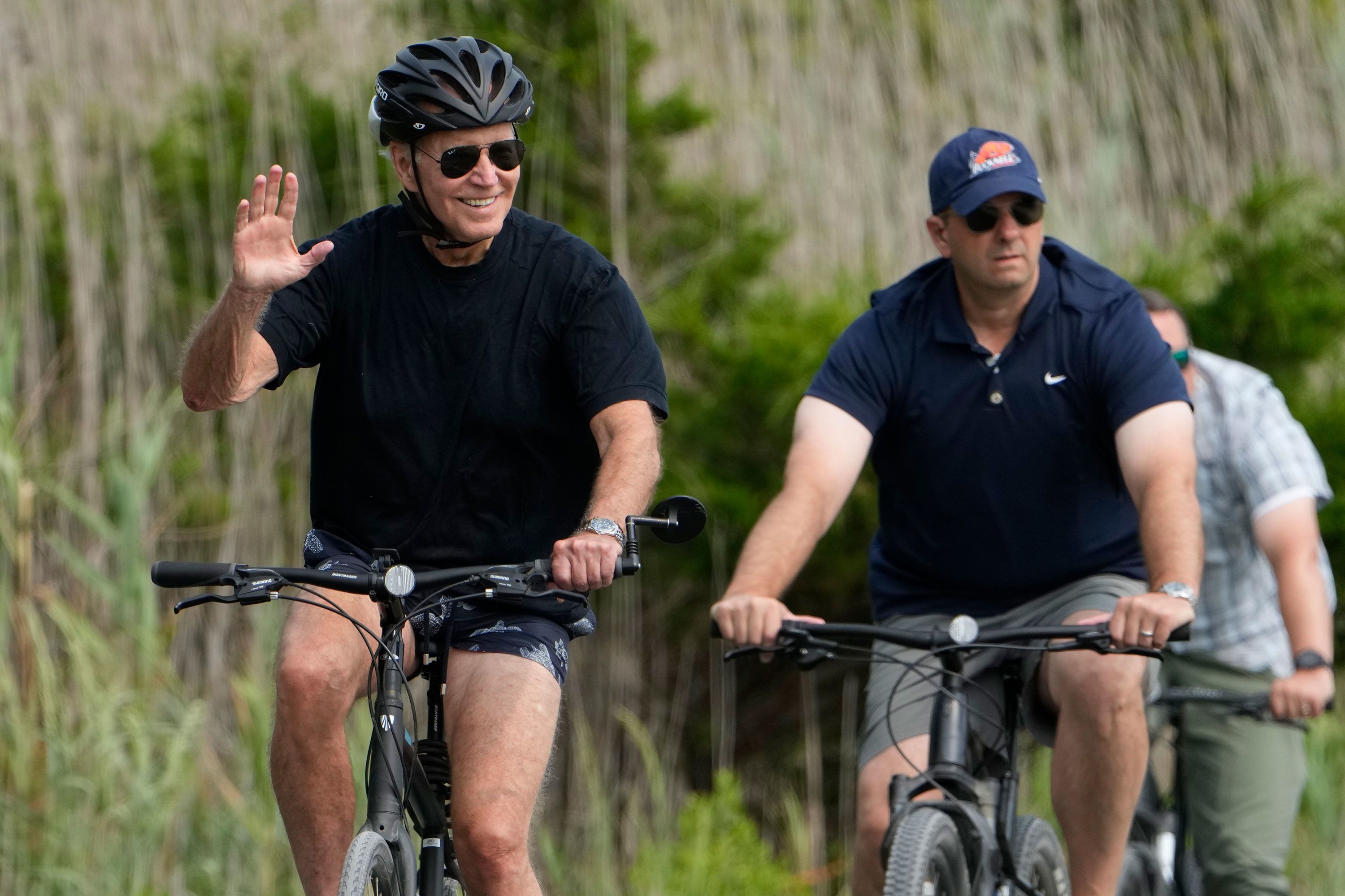 President Joe Biden rides his bike in Rehoboth Beach, Delaware, on Aug. 3, 2023. Manuel Balce Ceneta/AP via CNN