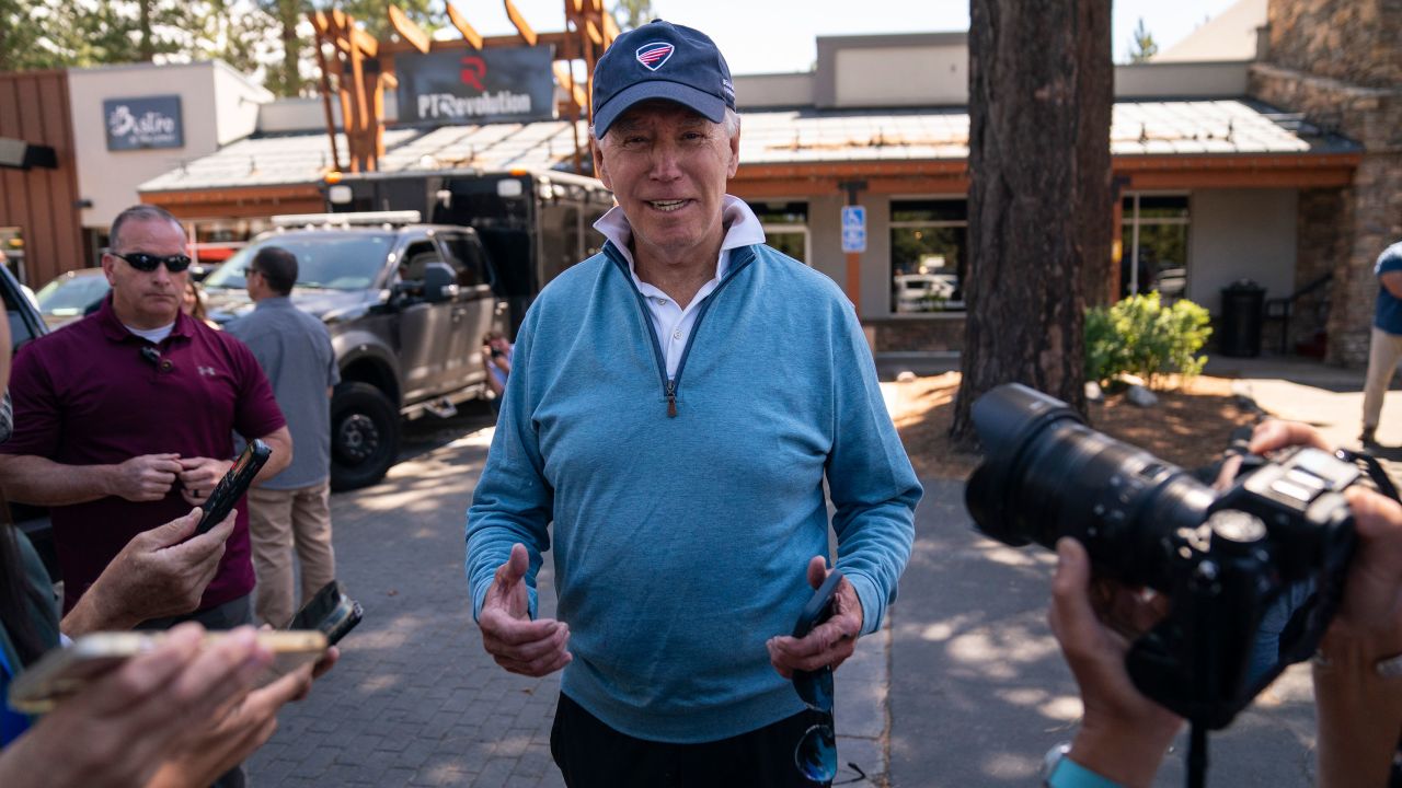 President Joe Biden talks with reporters after taking a Pilates class on August 25, 2023, in South Lake Tahoe, California.