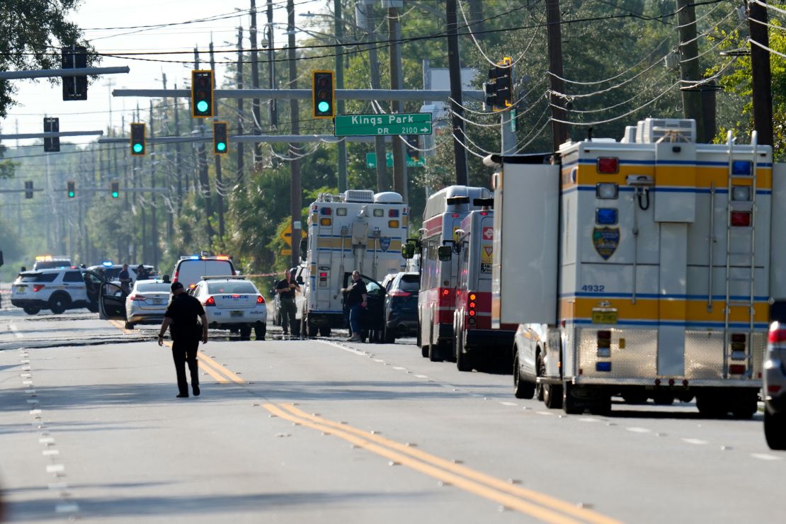 Authorities respond to the scene of a shooting at a Dollar General store, Saturday, Aug. 26, 2023, in Jacksonville, Fla.