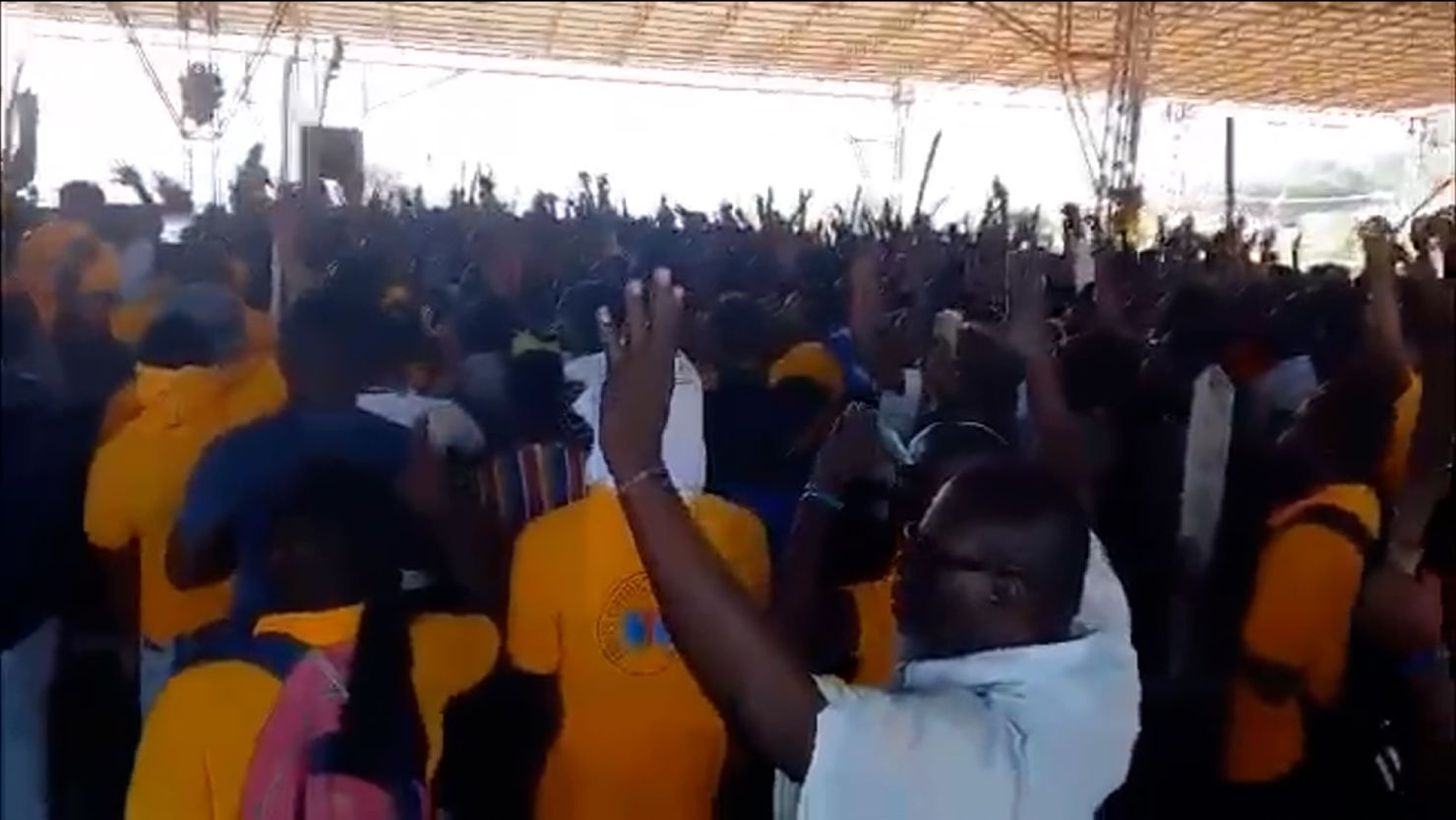 A screenshot from a video shows church-led protestors marching against gang violence in  Port-au-Prince, Haiti. 
