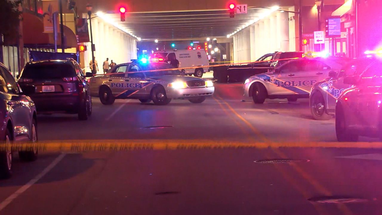 Authorities respond to the scene of a shooting in downtown Louisville early Sunday, August 27.