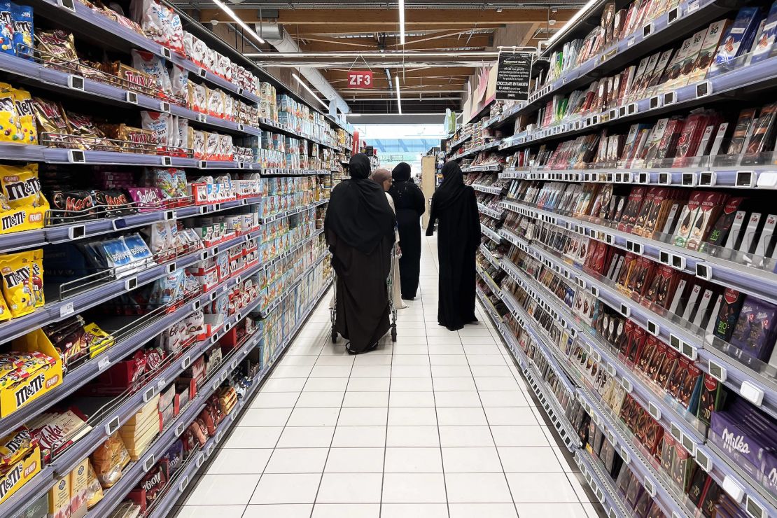 Muslim women are pictured in a shopping mall in Nanterre, France, in July.