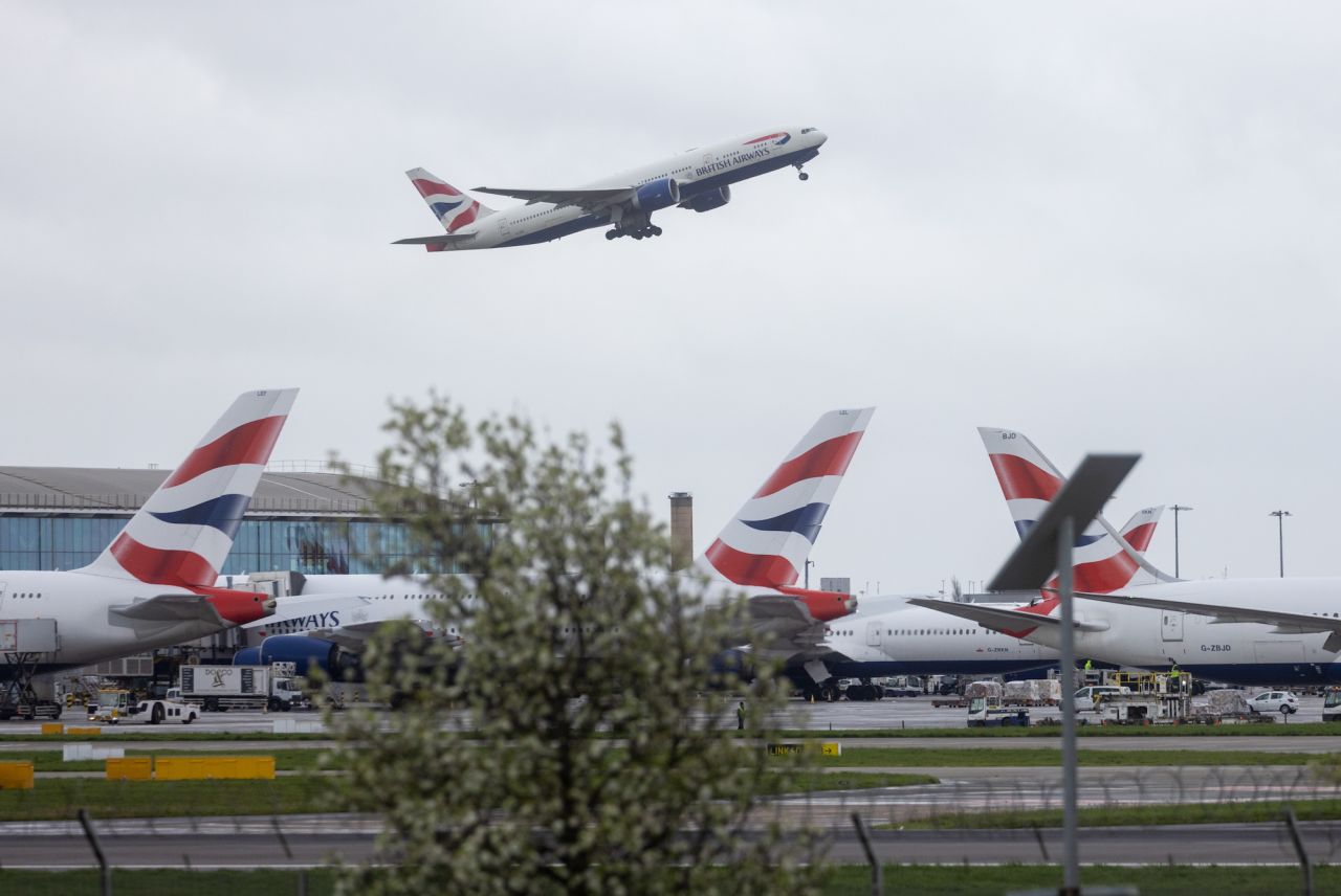 A passenger airplane, operated by British Airways, takes off from London Heathrow Airport in London, UK, on Friday, March 31, 2023. British Airways is set to scrap 320 flights during the Easter week as security workers strike for 10-days over pay. Photographer: Chris Ratcliffe/Bloomberg