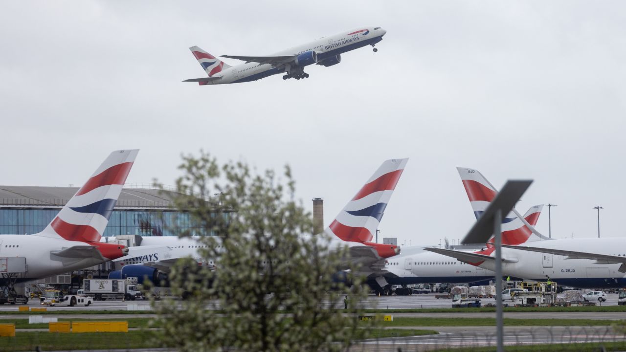A passenger airplane, operated by British Airways, takes off from London Heathrow Airport in London, UK, on Friday, March 31, 2023. British Airways is set to scrap 320 flights during the Easter week as security workers strike for 10-days over pay. Photographer: Chris Ratcliffe/Bloomberg