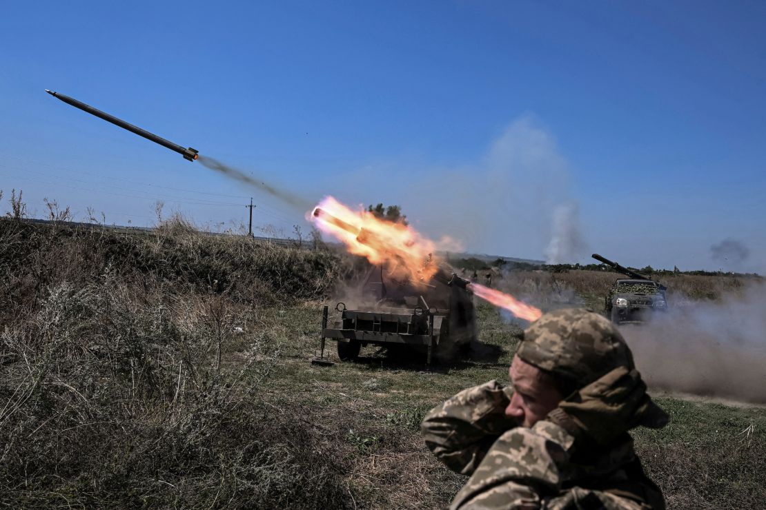 Ukrainian troops fire small multiple launch rocket systems toward Russian forces near a front line in the Zaporizhzhia region on August 19. 