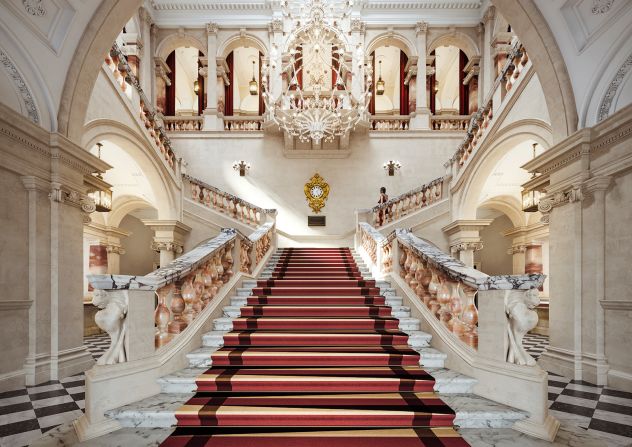 <strong>Historic elements:</strong> The hotel's grand marble staircase lined with red carpet with the original logo from the Old War Office is among the original Edwardian features within the property.