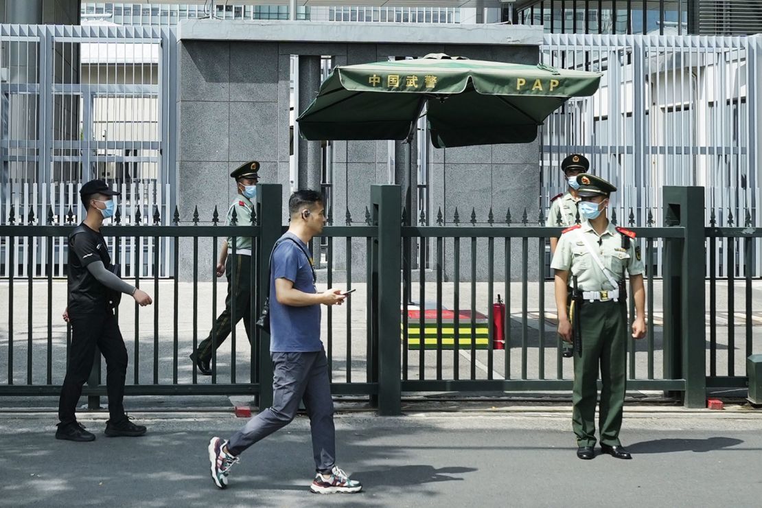 Security officers in front of the Japanese embassy in Beijing, China, on August 26, 2023.