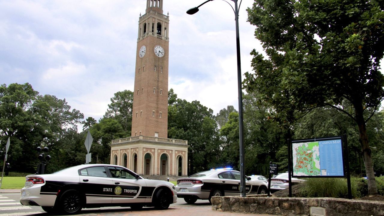 Law enforcement respond to the University of North Carolina at Chapel Hill campus in Chapel Hill, N.C., on Monday, Aug. 28, 2023, after the university locked down and warned of an armed person on campus. (AP Photo/Hannah Schoenbaum)