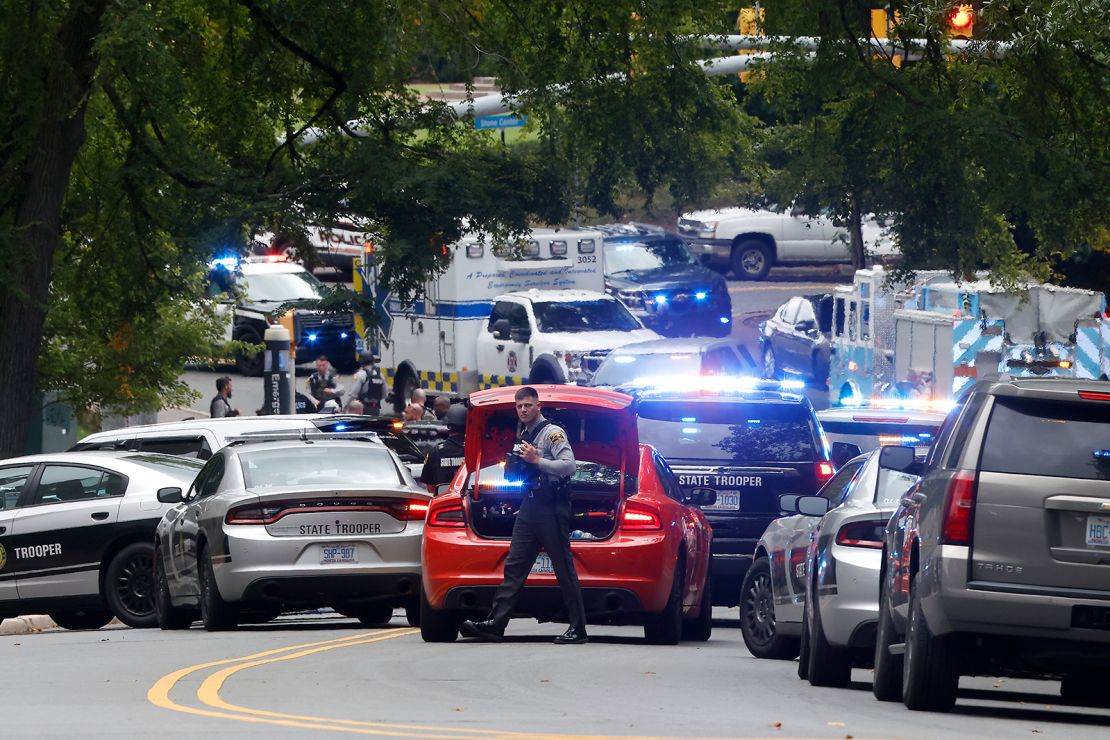 Emergency responders gather on South Street near the Bell Tower on the University of North Carolina at Chapel Hill campus on Monday.