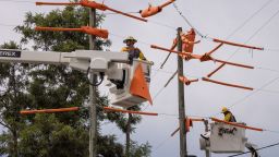 Workers with Pike Electric fortify power lines ahead of Hurricane Idalia in Clearwater, Florida, U.S., August 29, 2023. REUTERS/Adrees Latif