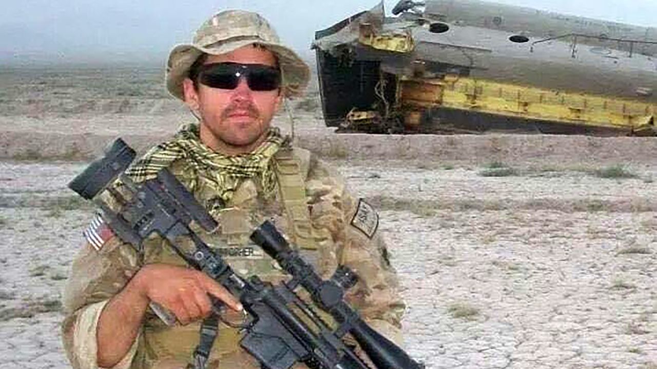 Spc. Chris Horton, a sniper with 1st Battalion, 297th Infantry Regiment, 45th Infantry Brigade Combat Team, Oklahoma Army National Guard, stands with his weapon in Paktia, Afghanistan, in 2011.