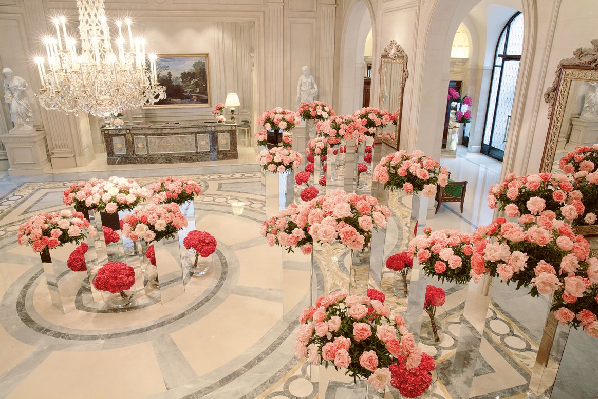Coral charm peonies and hydrangeas, pictured in an installation in the lobby of the Four Seasons George V Hotel in Paris.