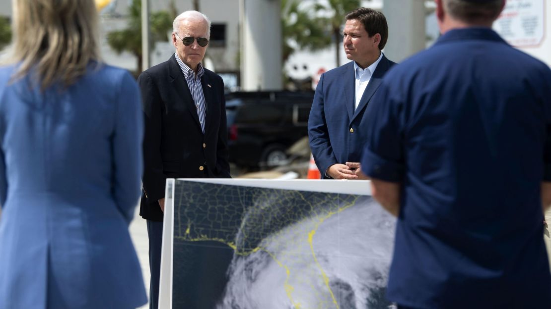 In this October 2022 photo, DeSantis and President Joe Biden meet with residents and emergency workers in Fort Myers Beach, Florida, as they inspect the damage caused by Hurricane Ian. 