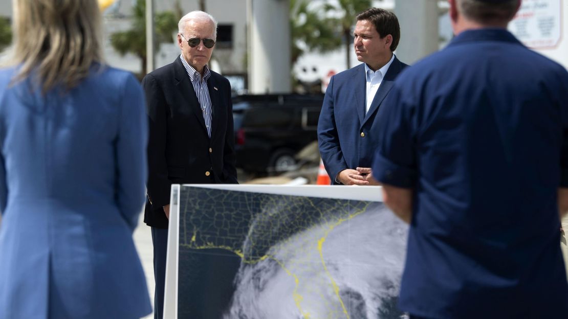 In this October 2022 photo, DeSantis and President Joe Biden meet with residents and emergency workers in Fort Myers Beach, Florida, as they inspect the damage caused by Hurricane Ian.