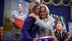 US Representative Madeleine Dean hugs Christy Shamblin, mother-in-law of Marine Corps Sergeant Nicole L. Gee who was killed in Afghanistan following "A Gold Star Families Roundtable: Examining the Abbey Gate Terrorist Attack" regarding an attack in Afghanistan, before the House Foreign Affairs Committee on Capitol Hill in Washington, DC, on August 29.