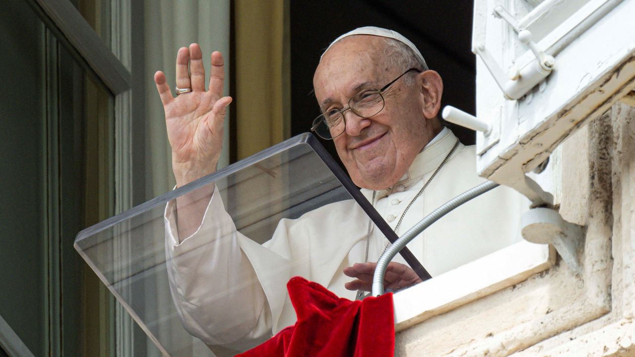 Pope Francis leads the Angelus prayer from his window at the Vatican, on August 27, 2023.