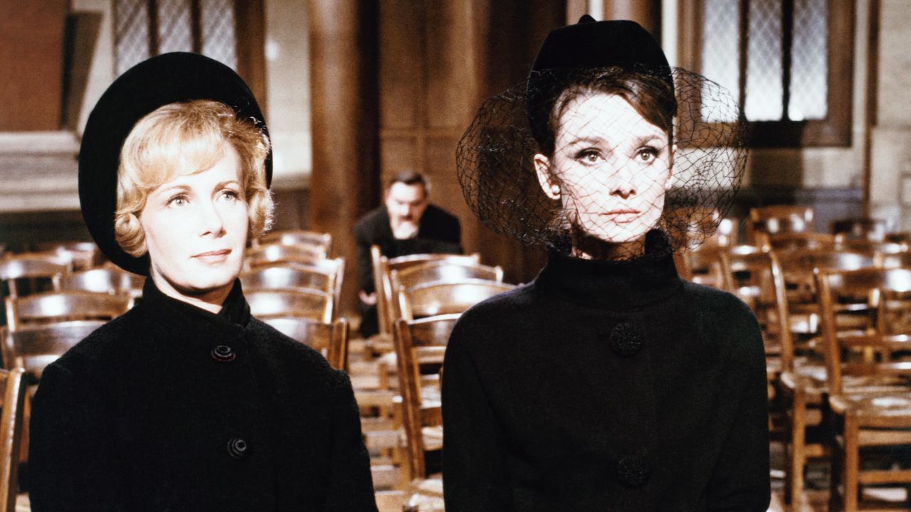 CHARADE, from left: Dominique Minot, Audrey Hepburn, 1963