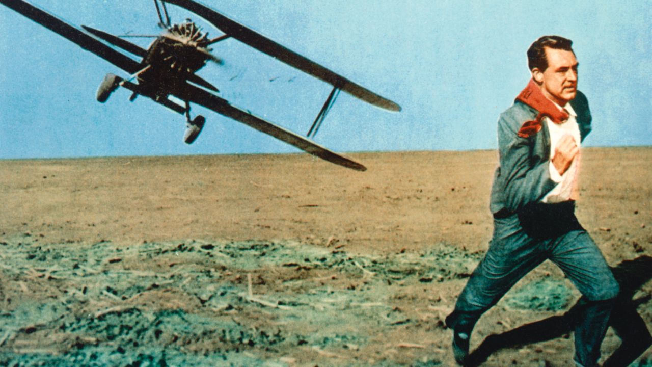 Cary Grant (19041986) running as he comes under attack from a biplane under attack in an iconic scene issued as a publicity still for the film, 'North by Northwest', USA, 1959. The 1959 film, directed by Alfred Hitchcock (18991980), starred Grant as 'Roger Thornhill'. (Photo by Silver Screen Collection/Getty Images)