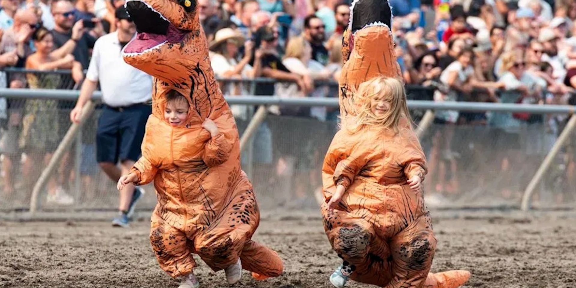 Washington runners take to the race track for a hilarious dinosaur race