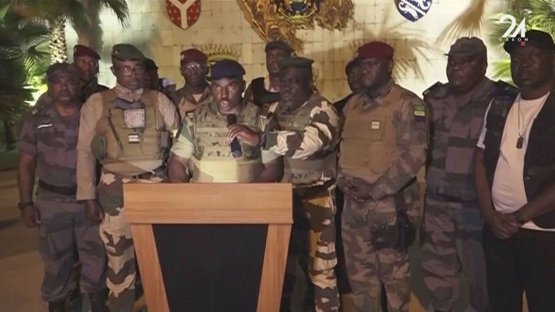 Military officers announce the seizure of government from Gabonese President Ali Bongo Ondimba in Libreville on Wednesday. 
