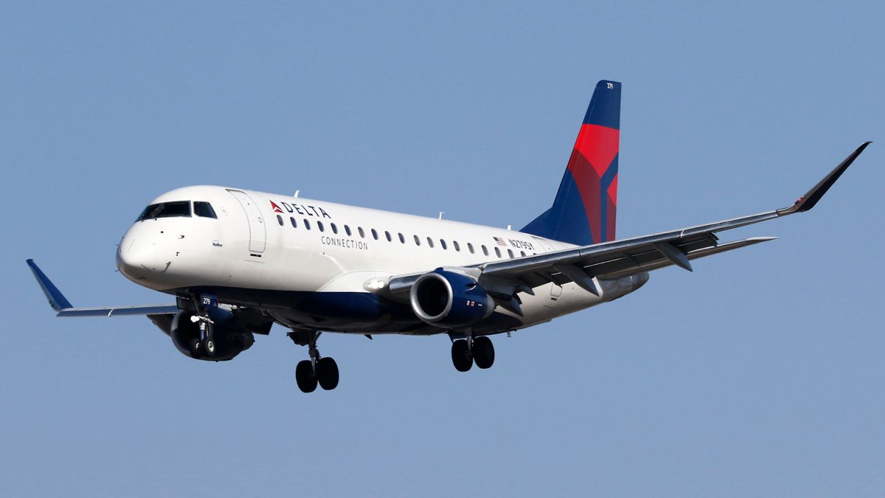 An Embraer 175 (ERJ 175LR, registration N279SY) regional jetliner belonging to SkyWest Airlines and in Delta Connection livery lands at Harry Reid (formerly McCarren) International Airport in Las Vegas, Nv., on February 15, 2022.