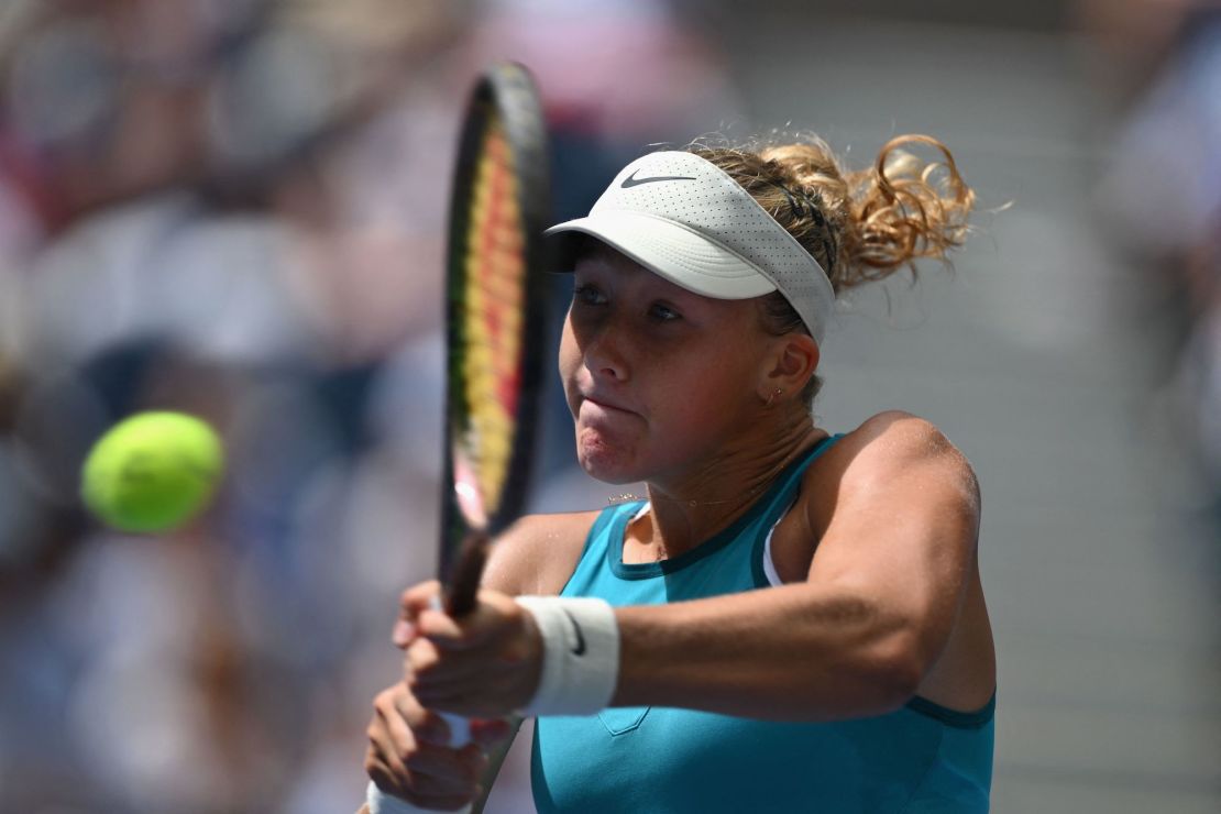 Russia's Mirra Andreeva hits a return to USA's Coco Gauff during the US Open tennis tournament women's singles second round match at the USTA Billie Jean King National Tennis Center in New York City, on August 30, 2023. (Photo by ANGELA WEISS / AFP) (Photo by ANGELA WEISS/AFP via Getty Images)