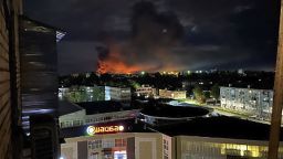 This image made from a social media and and provided by Ostorozhno Novosti shows smoke billowing over the city and a large blaze in Pskov, Russia, on Aug. 29, 2023. Russian officials accused Ukraine of targeting six Russian regions early Wednesday in what appeared to be the biggest drone attack on Russian soil since Moscow sent troops into Ukraine 18 months ago. (Ostorozhno Novosti via AP)