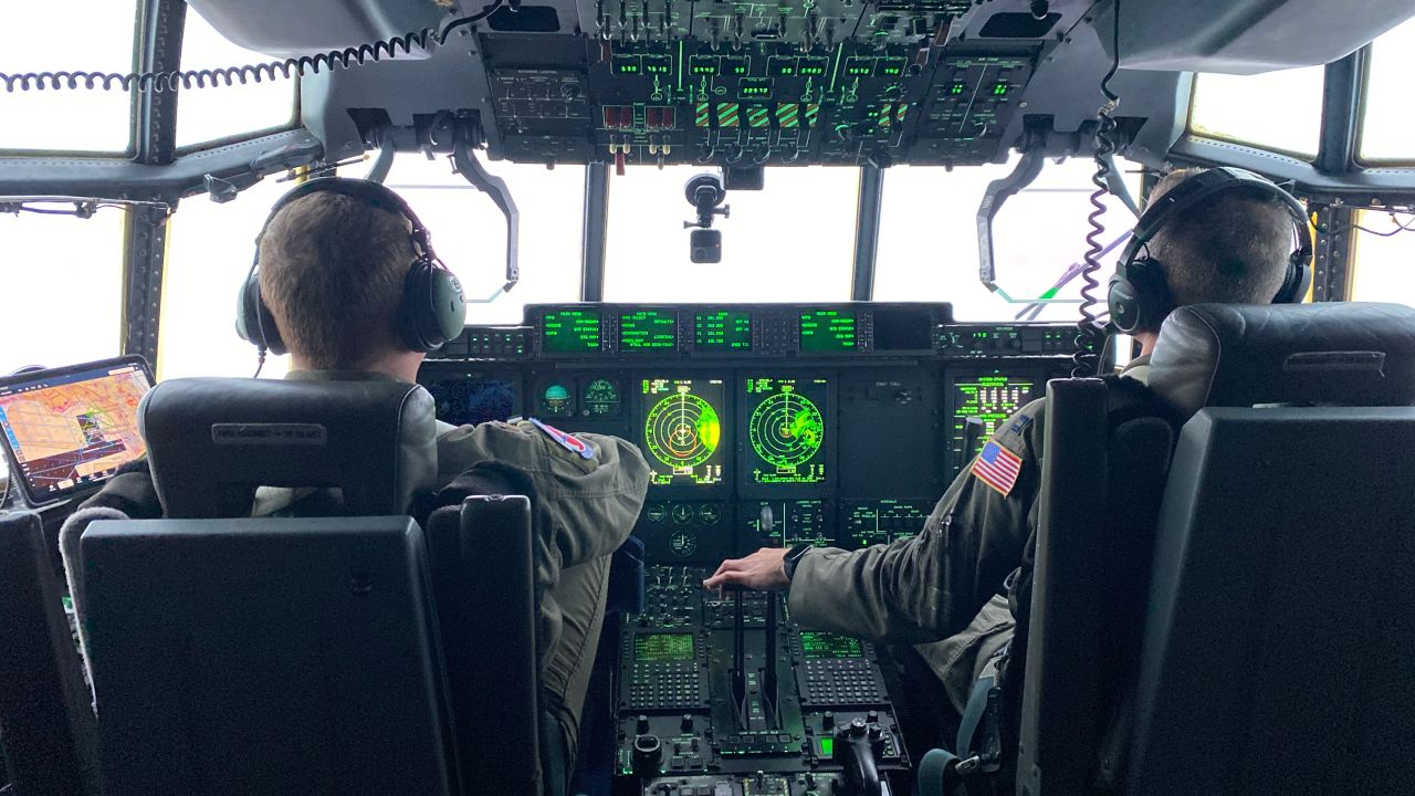 Crew members on board WC-130J Super Hercules aircraft during Hurricane Idalia.