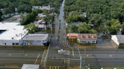 A vehicle drives through a flooded street in Crystal River, Florida, after Hurricane Idalia came onshore on Wednesday. 