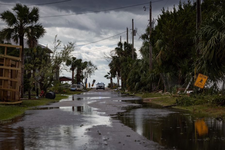 Local law enforcement surveys storm damage in Horseshoe Beach, Florida, on Wednesday, August 30.