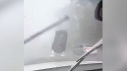 car flips tornado