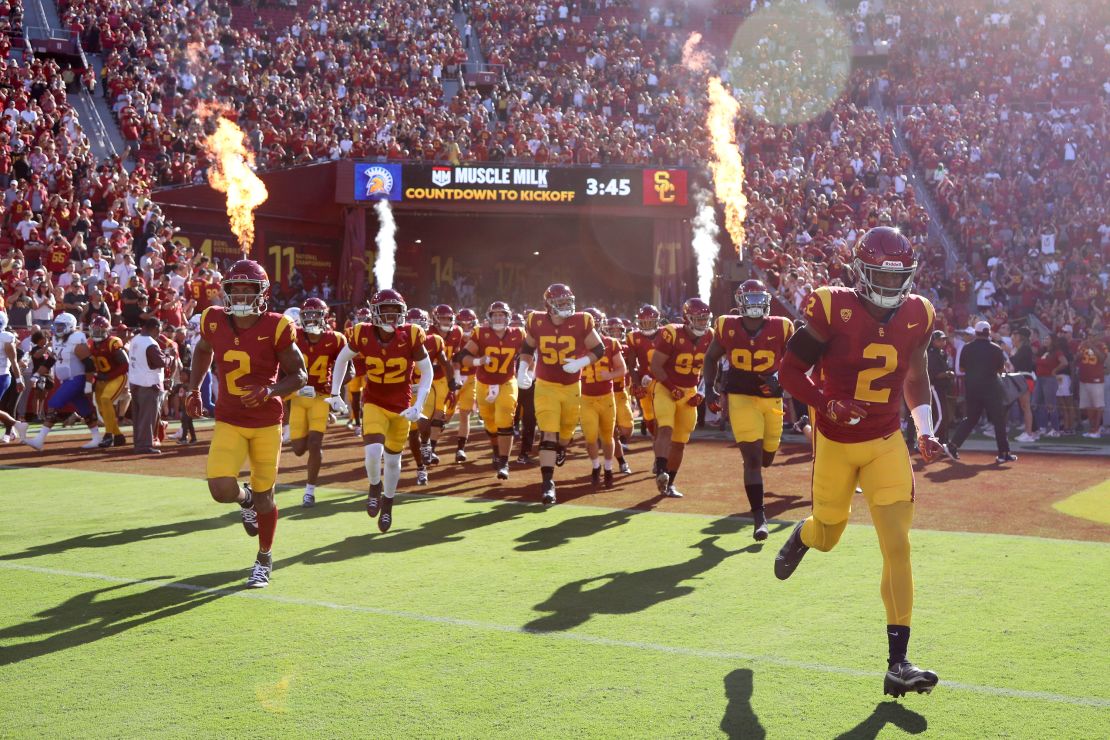 LOS ANGELES, CALIFORNIA - AUGUST 26: The USC Trojans run onto the field prior to the game against the San Jose State Spartans at United Airlines Field at the Los Angeles Memorial Coliseum on August 26, 2023 in Los Angeles, California. (Photo by Katelyn Mulcahy/Getty Images)
