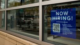An employee hiring sign with a QR code is seen in a window of a business in Arlington, Virginia, U.S., April 7, 2023. REUTERS/Elizabeth Frantz