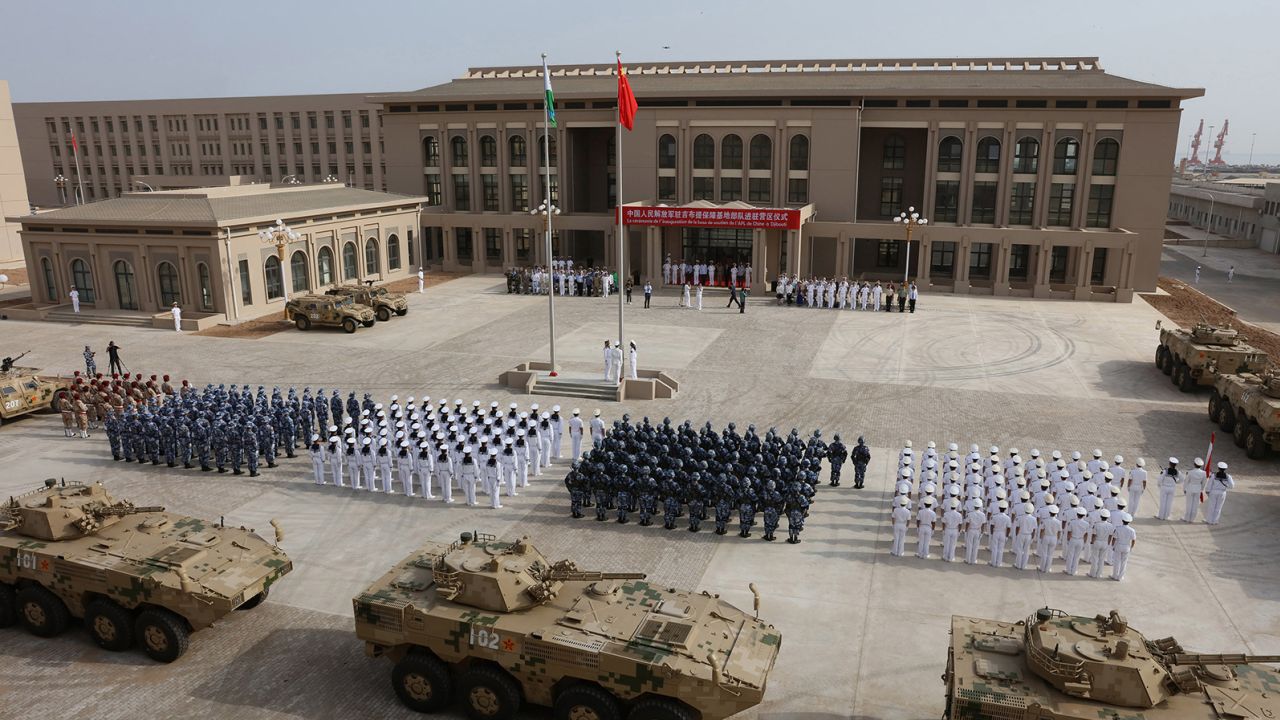 This photo taken on August 1, 2017, shows Chinese People's Liberation Army personnel attending the opening ceremony of China's new military base in Djibouti. 