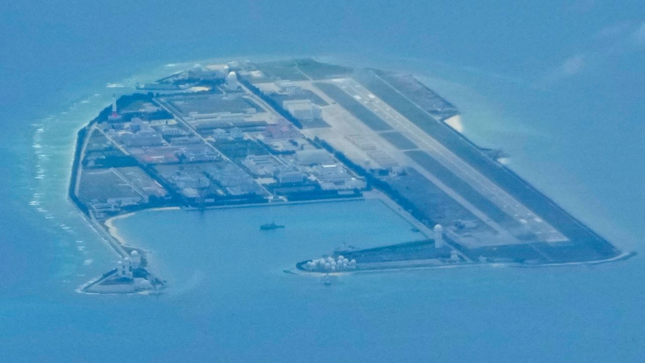 Chinese structures and buildings at the man-made island on Mischief Reef at the Spratlys group of islands in the South China Sea are seen on Sunday March 20, 2022. 