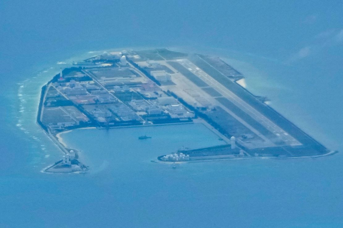 Chinese structures and buildings at the man-made island on Mischief Reef at the Spratlys group of islands in the South China Sea are seen on Sunday March 20, 2022. 