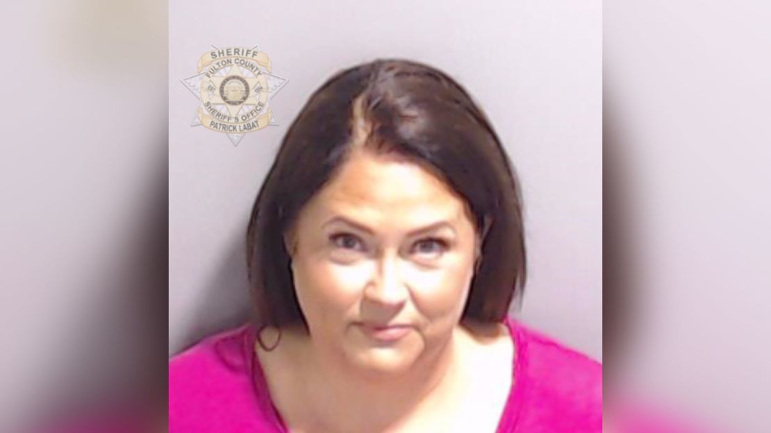 A booking photo shows former election supervisor Misty Hampton, who is a familiar face to voters in Coffee County.